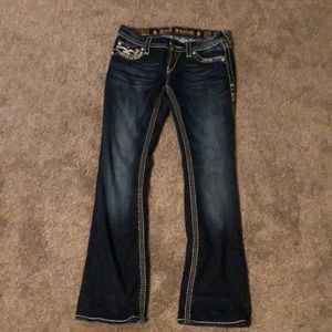 Blue boot cut rock revival jeans